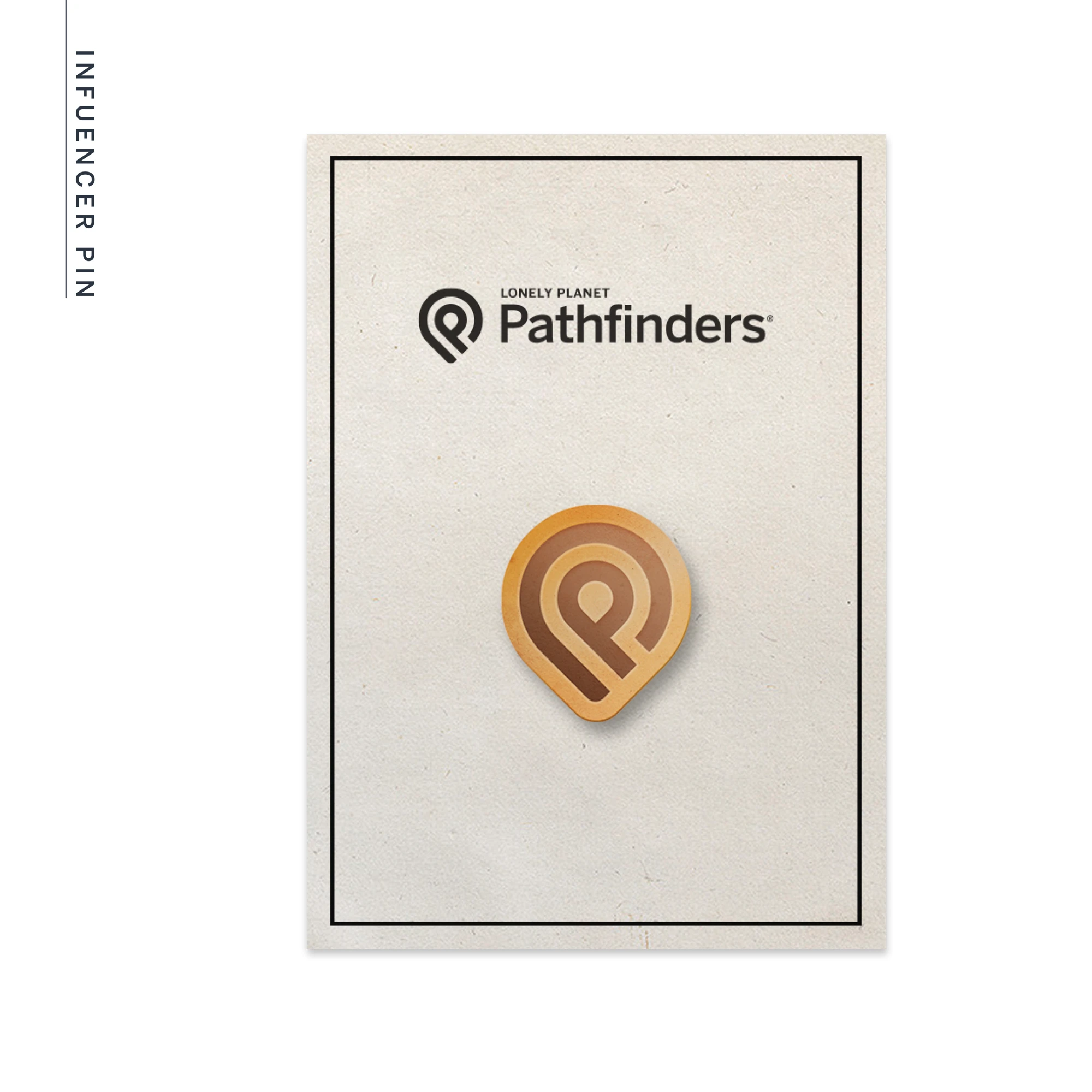 Pathfinders enamel pin on a printed card