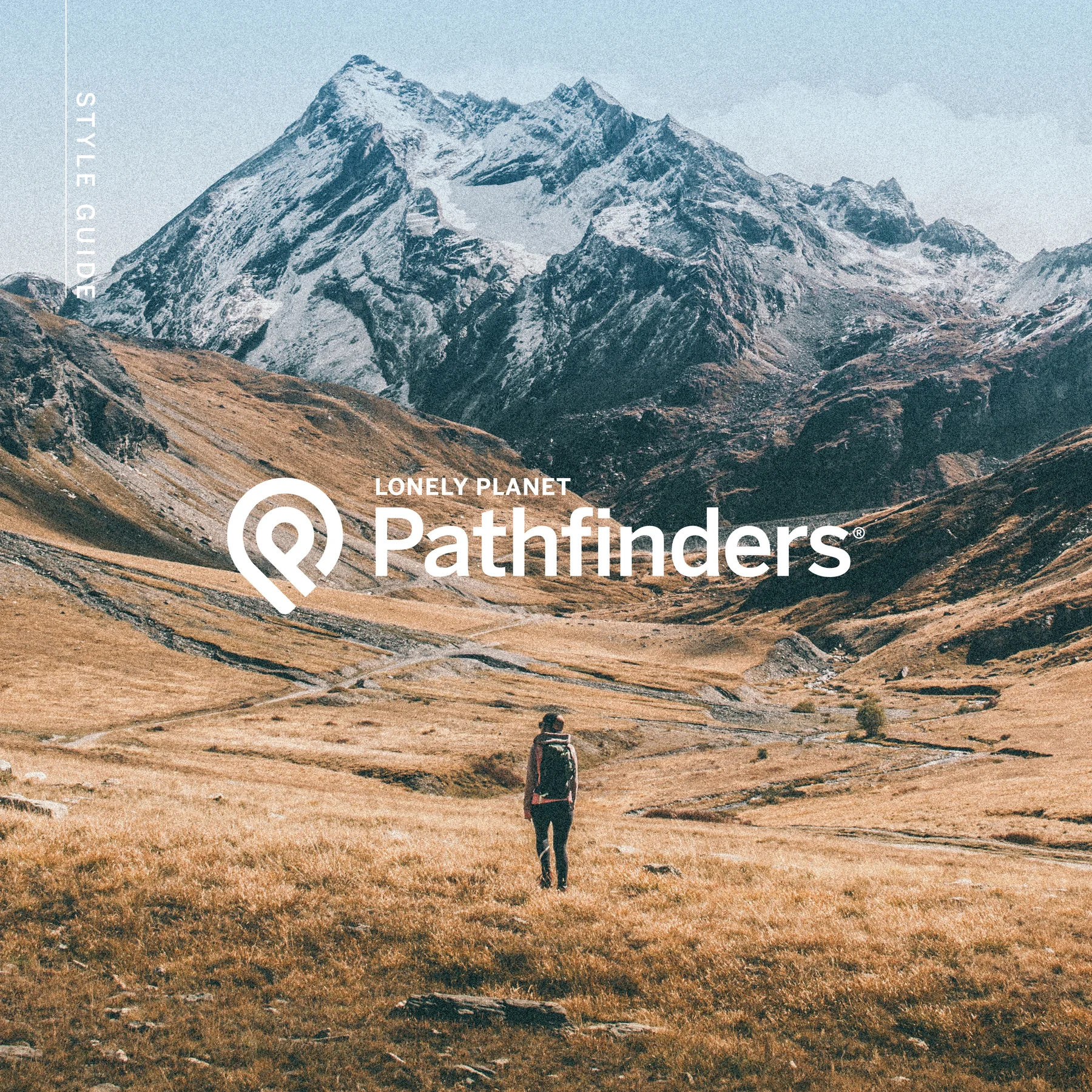 Lonely Planet Pathfinders identity over a mountain landscape